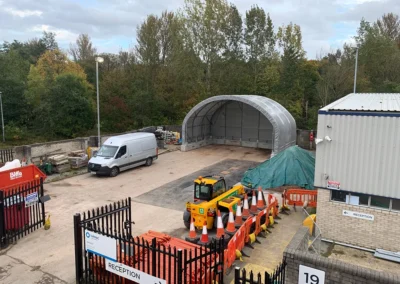 TUFFShel Max in action on a busy industrial site, creating practical covered space for materials and equipment.